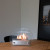 Tischkamin mit Glas in rundem Design
