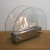 Tischkamin mit Glas in rundem Design